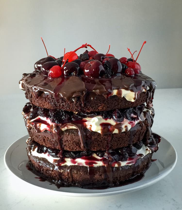 a brown cakes with cherry on the top